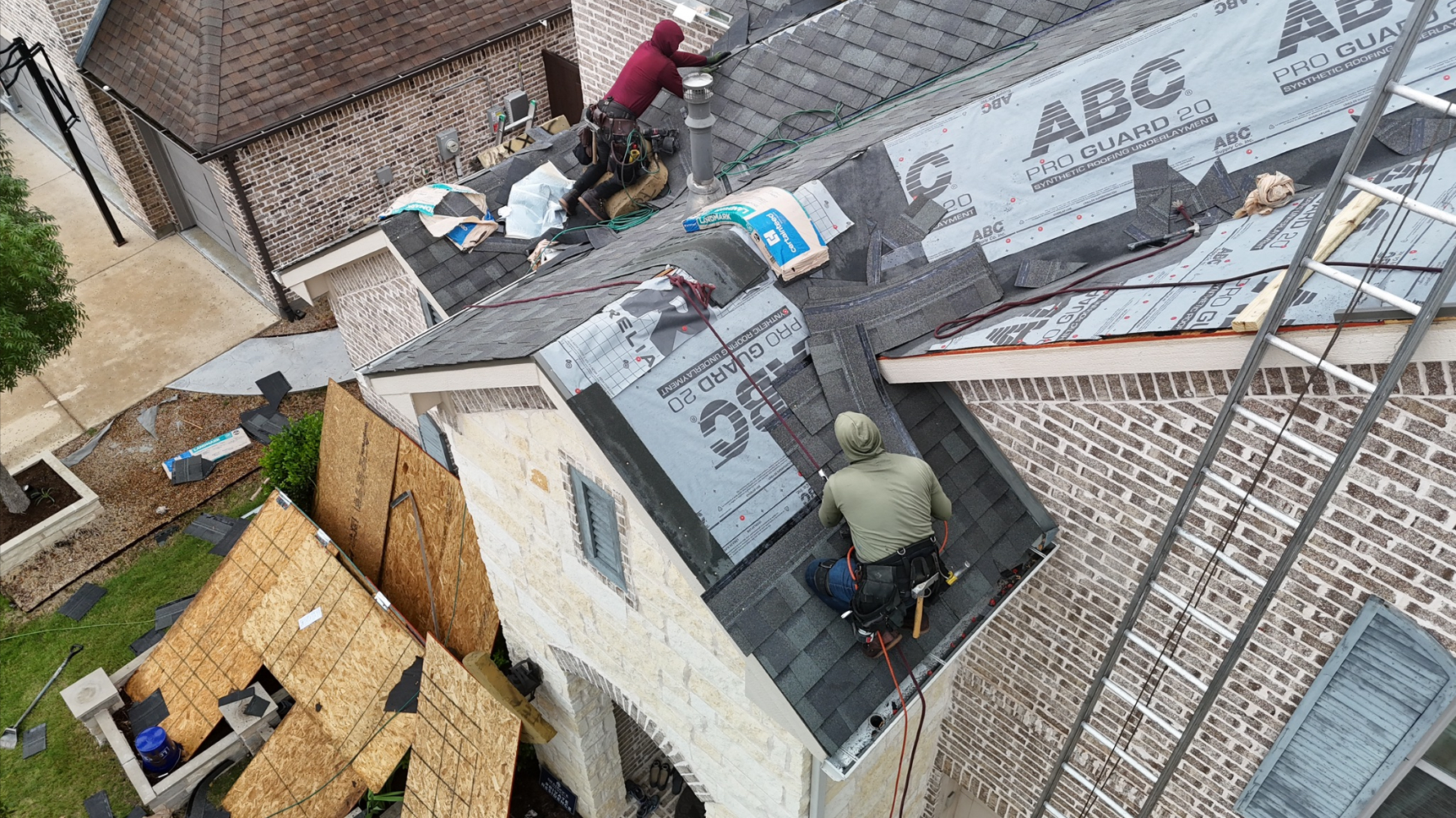 Aerial view of complex roof installation with property protection