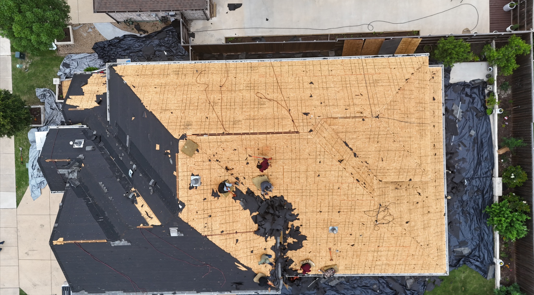 Aerial view of roof decking and underlayment installation