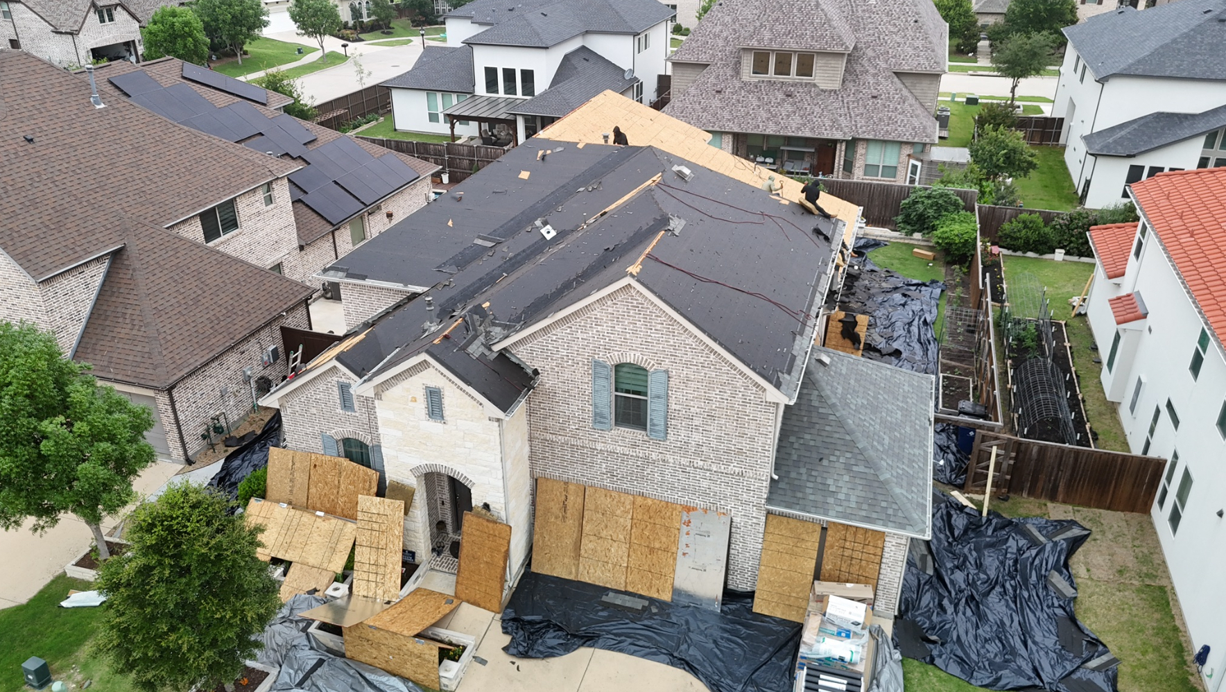 Wide aerial view of home with full property protection