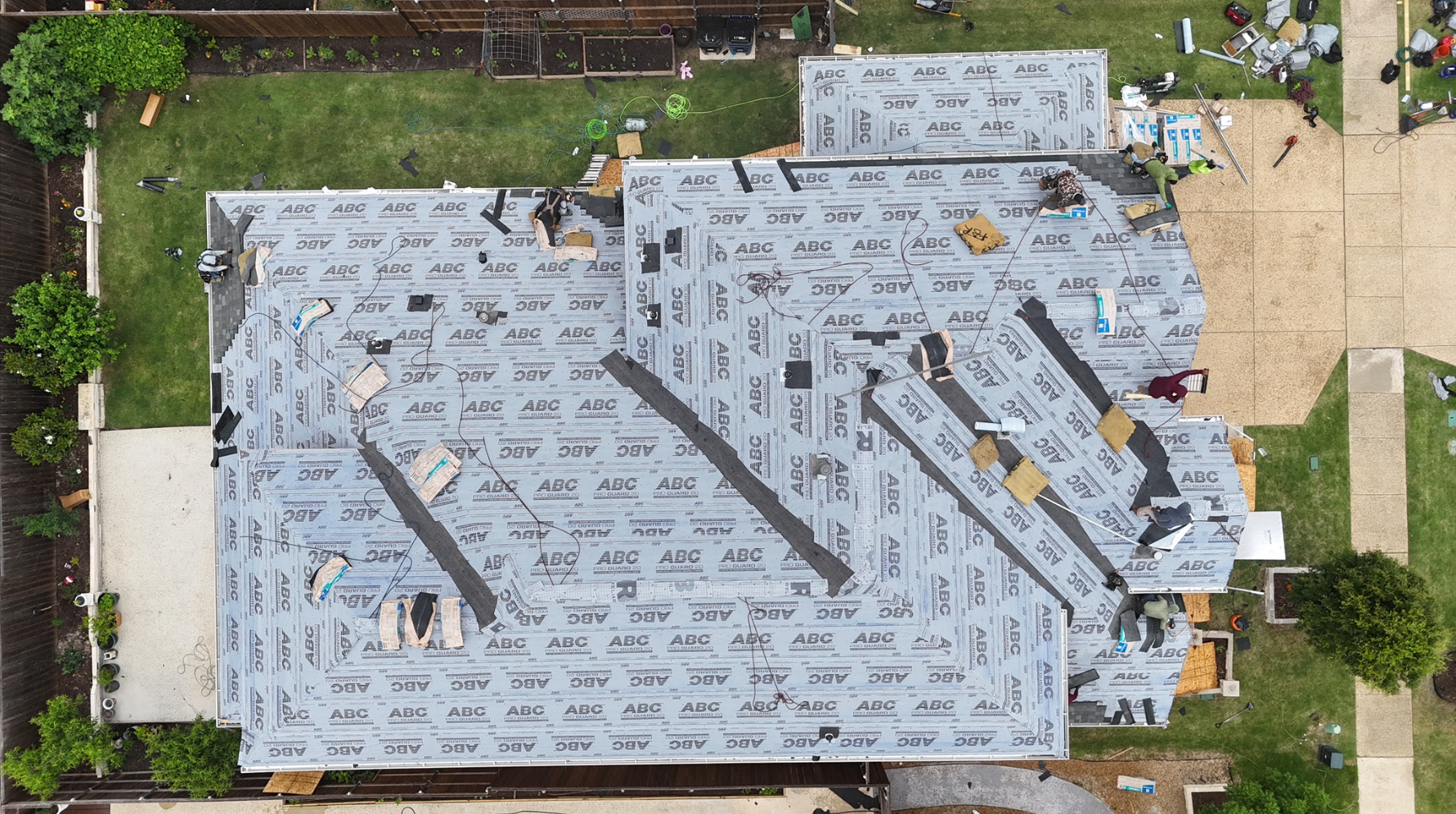 Complete synthetic underlayment coverage on large residential roof